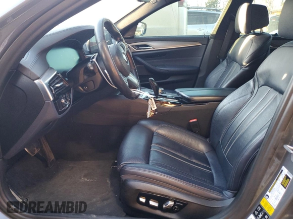 2019 BMW 5 Series M550i xDrive with VIN WBAJB9C55KB288709, listed as a Copart auction lot 46590735 with 58,256 mi miles and Salvage title. Bid and sale history available at DreamBid. Image 7.
