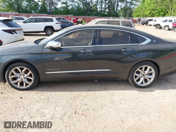 2015 Chevrolet Impala LTZ with VIN 2G1155SL6F9133136, listed as a IAAI auction lot 42024420 with 149,688 mi miles and . Bid and sale history available at DreamBid. Image 14.