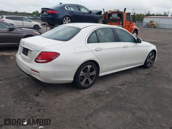 2018 Mercedes-Benz E-Class E 300 with VIN WDDZF4JB2JA350535, listed as a IAAI auction lot 41615741 with 148,004 mi miles. Bid and sale history available at carsss.com. Image 4.