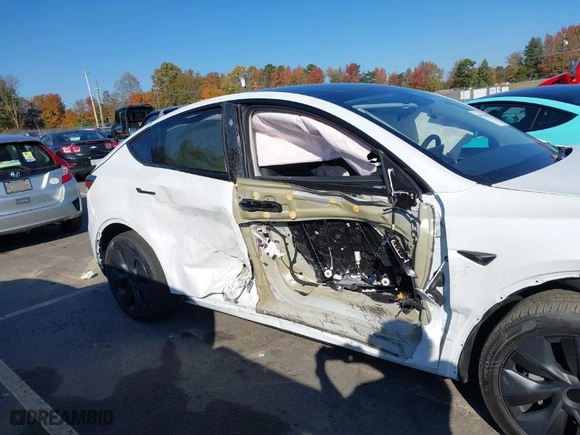 2024 Tesla Model Y with VIN 7SAYGDED8RA331778, listed as a IAAI auction lot 40716650 with NaN miles. Bid and sale history available at carsss.com. Image 13.