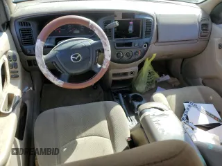 2002 Mazda Tribute LX with VIN 4F2YU09122KM62196, listed as a Copart auction lot 77327034 with 256,385 mi miles and Salvage Title. Bid and sale history available at carsss.com. Image 8.