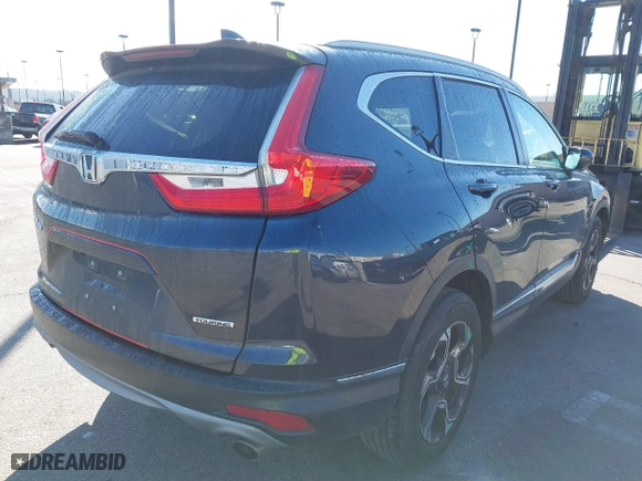 2019 Honda CR-V Touring with VIN 7FARW1H92KE014019, listed as a IAAI auction lot 41691555 with 32,635 mi miles. Bid and sale history available at carsss.com. Image 4.