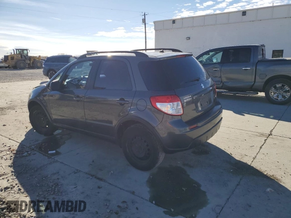 2010 Suzuki SX4 z VIN JS2YA5A35A6301406, wystawiony jako Copart lot #81810084 z przebiegiem 134 349 mil mil oraz Szkody całkowita. Historia ofert i sprzedaży dostępna na DreamBid. Obrazek 2.