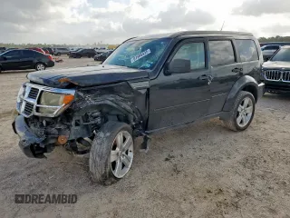 2011 Dodge Nitro Heat with VIN 1D4PT4GK2BW572811, listed as a Copart auction lot 61505435 with 125,873 mi miles and Salvage title. Bid and sale history available at DreamBid. Image 1.
