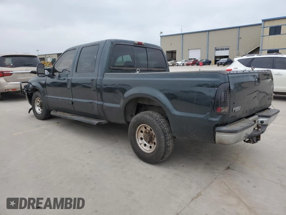 2002 Ford F-250 XL with VIN 1FTNW20F12EA79821, listed as a Copart auction lot 49194604 with 466,631 mi miles and Salvage Title. Bid and sale history available at DreamBid. Image 2.