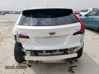 2023 Cadillac XT4 FWD Premium Luxury with VIN 1GYFZCR42PF110122, listed as a Copart auction lot 57332955 with 11,427 mi miles and Salvage title. Bid and sale history available at DreamBid. Image 6.