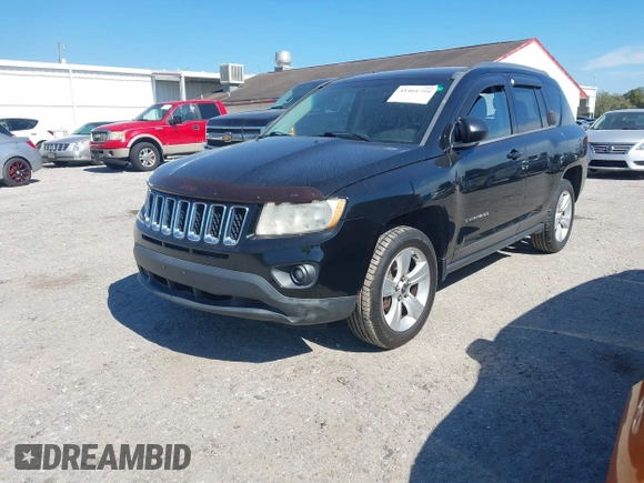 2013 Jeep Compass Sport with VIN 1C4NJDBB1DD217533, listed as a IAAI auction lot 41461759 with 205,972 mi miles. Bid and sale history available at carsss.com. Image 2.