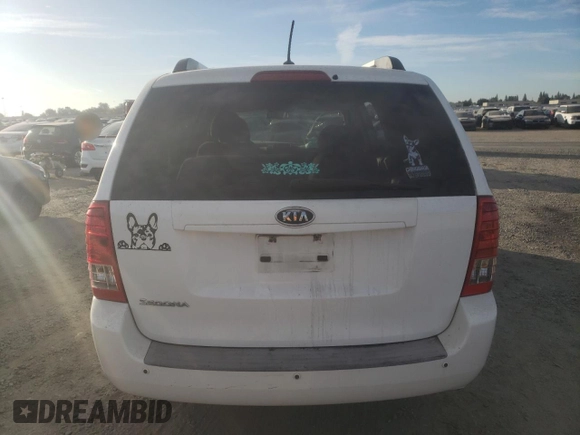 2011 Kia Sedona LX with VIN KNDMG4C74B6370803, listed as a Copart auction lot 77228344 with 142,394 mi miles and Salvage Title. Bid and sale history available at DreamBid. Image 6.