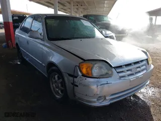 2003 Hyundai Accent GL with VIN KMHCG45C93U476176, listed as a IAAI auction lot 41940608 with 212,264 mi miles. Bid and sale history available at carsss.com. Image 1.