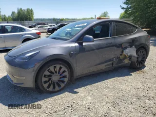 2022 Tesla Model Y Performance z VIN 7SAYGDEF3NF384161, wystawiony jako Copart lot #59989145 z przebiegiem 12 731 mil mil oraz Szkoda całkowita • Salvage title. Historia ofert i sprzedaży dostępna na DreamBid. Obrazek 1.