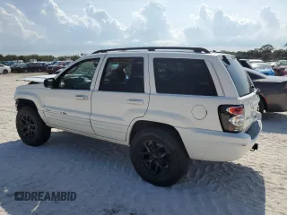 2002 Jeep Grand Cherokee Limited with VIN 1J4GX58S52C121941, listed as a Copart auction lot 55472015 with 182,225 mi miles and Salvage Title. Bid and sale history available at DreamBid. Image 2.