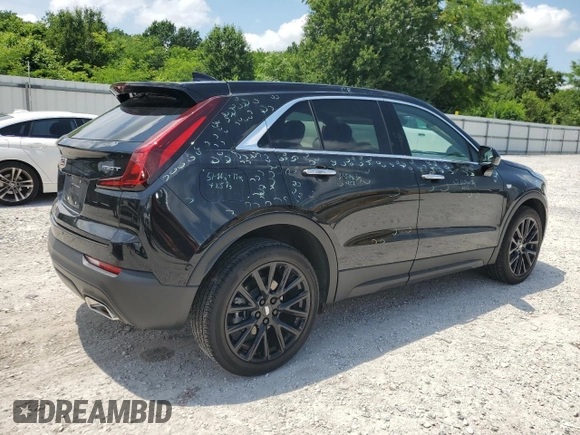 2023 Cadillac XT4 FWD Luxury с VIN 1GYAZAR47PF107473, выставлен на аукционе Copart как лот 59137665 с пробегом 9 198 миль миль и Списание • Salvage title. История ставок и продаж доступна на DreamBid. Изображение 3.