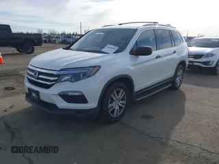 2016 Honda Pilot LX with VIN 5FNYF6H1XGB009768, listed as a IAAI auction lot 41666109 with 137,733 mi miles. Bid and sale history available at carsss.com. Image 17.