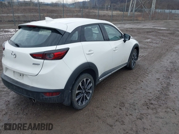 2019 Mazda CX-3 Grand Touring with VIN JM1DKFD76K0426879, listed as a IAAI auction lot 41669200 with 31,881 mi miles. Bid and sale history available at carsss.com. Image 4.