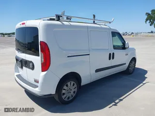 2021 Ram ProMaster City Cargo Van Tradesman SLT with VIN ZFBHRFBBXM6U21983, listed as a IAAI auction lot 41984546 with 156,279 mi miles. Bid and sale history available at carsss.com. Image 4.