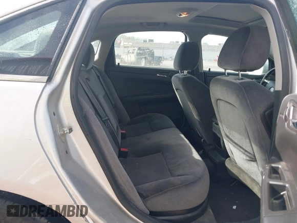 2014 Chevrolet Impala LT with VIN 2G1WB5E38E1188520, listed as a IAAI auction lot 41935176 with 82,503 mi miles and . Bid and sale history available at DreamBid. Image 8.