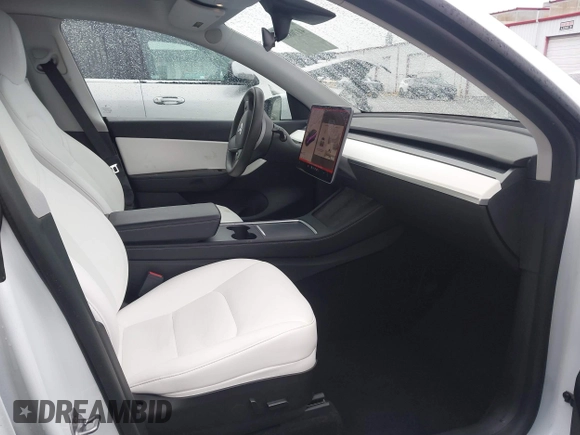 2021 Tesla Model Y Performance with VIN 5YJYGDEF2MF230374, listed as a IAAI auction lot 41708828 with 20,272 mi miles. Bid and sale history available at carsss.com. Image 5.