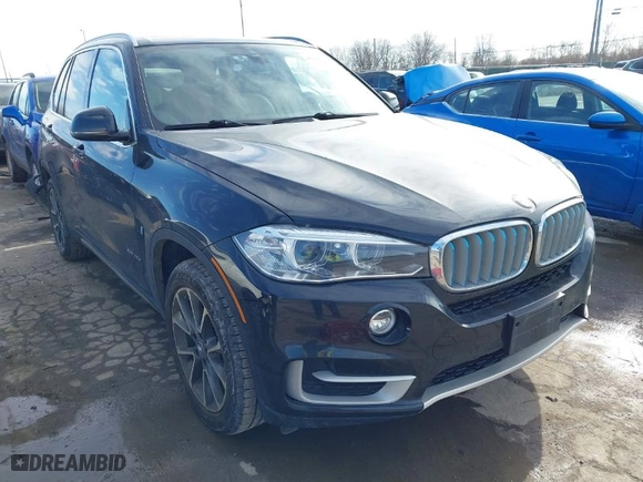 2018 BMW X5 xDrive40e iPerformance with VIN 5UXKT0C52J0W02406, listed as a IAAI auction lot 41449943 with 74,215 mi miles. Bid and sale history available at carsss.com. Image 1.