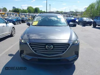 2021 Mazda CX-9 Touring with VIN JM3TCACY7M0503484, listed as a IAAI auction lot 42013262 with 63,777 mi miles and . Bid and sale history available at DreamBid. Image 13.