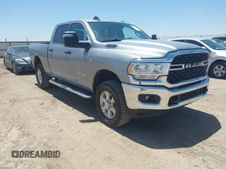 2023 Ram 2500 Big Horn with VIN 3C6UR5DL1PG654074, listed as a IAAI auction lot 42255020 with 67,732 mi miles and . Bid and sale history available at DreamBid. Image 1.