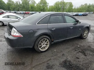 2008 Mercury Sable Premier z VIN 1MEHM43W98G604677, wystawiony jako Copart lot #57840985 z przebiegiem 171 695 mil mil oraz Szkoda całkowita • Salvage title. Historia ofert i sprzedaży dostępna na DreamBid. Obrazek 3.