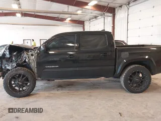 2017 Toyota Tacoma SR5 with VIN 5TFCZ5AN0HX053441, listed as a IAAI auction lot 42376148 with 100,996 mi miles and . Bid and sale history available at DreamBid. Image 14.