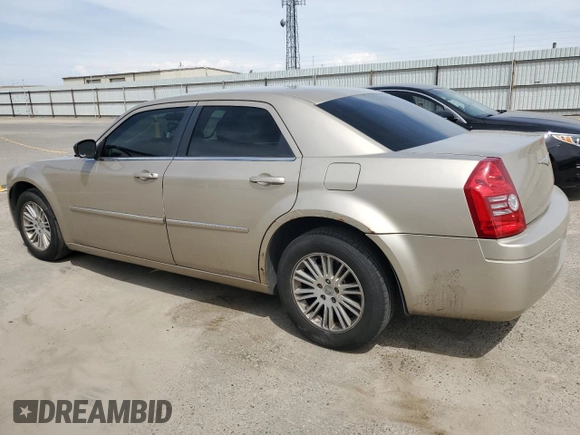 2009 Chrysler 300 LX with VIN 2C3KA43D39H553539, listed as a Copart auction lot 53302985 with 179,834 mi miles and Salvage Title. Bid and sale history available at DreamBid. Image 2.