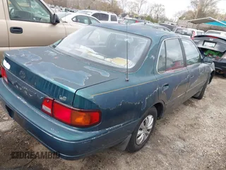 1996 Toyota Camry DX with VIN JT2BG12K1T0344507, listed as a IAAI auction lot 41832481 with 176,216 mi miles. Bid and sale history available at carsss.com. Image 4.