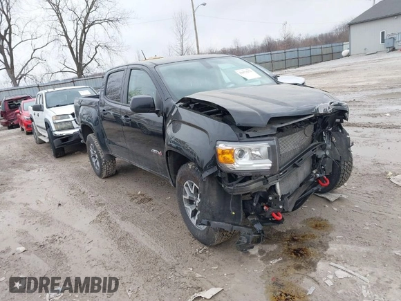 2021 GMC Canyon 4WD AT4 w/Leather with VIN 1GTG6FEN4M1103068, listed as a IAAI auction lot 41673275 with 62,254 mi miles. Bid and sale history available at carsss.com. Image 1.