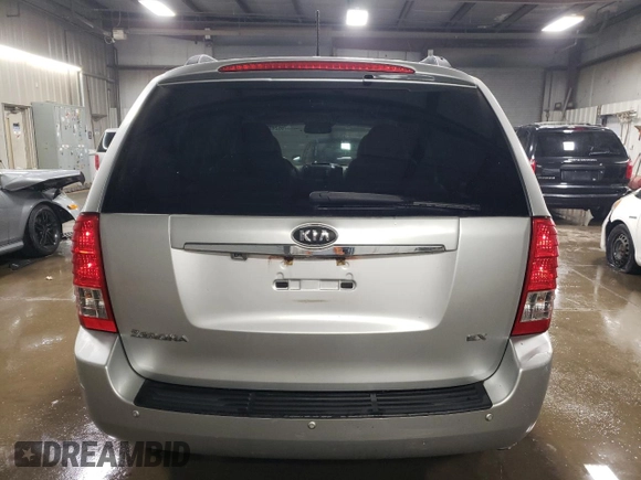 2012 Kia Sedona EX with VIN KNDMH4C7XC6483296, listed as a Copart auction lot 76624984 with 203,980 mi miles and Salvage Title. Bid and sale history available at carsss.com. Image 6.