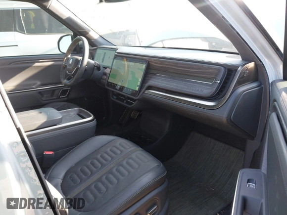 2022 Rivian R1T Adventure z VIN 7FCTGAAA5NN007018, wystawiony jako IAAI lot #42018939 z przebiegiem 41 991 mil mil oraz . Historia ofert i sprzedaży dostępna na DreamBid. Obrazek 5.