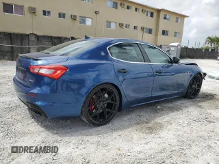 2020 Maserati Ghibli S GranSport z VIN ZAM57YSS3L1343510, wystawiony jako Copart lot #51256455 z przebiegiem 56 646 mil mil oraz Szkody całkowita. Historia ofert i sprzedaży dostępna na DreamBid. Obrazek 3.