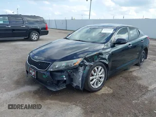 2015 Kia Optima EX with VIN 5XXGN4A75FG357829, listed as a IAAI auction lot 42302163 with 115,277 mi miles and . Bid and sale history available at DreamBid. Image 2.