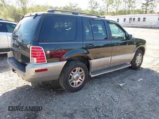 2003 Mercury Mountaineer Convenience z VIN 4M2DU66W13ZJ05239, wystawiony jako IAAI lot #42062881 z przebiegiem 292 631 mil mil oraz . Historia ofert i sprzedaży dostępna na DreamBid. Obrazek 4.