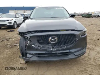 2017 Mazda CX-5 Grand Touring with VIN JM3KFBDL8H0102060, listed as a Copart auction lot 50938325 with 71,868 mi miles and Clean Title. Bid and sale history available at carsss.com. Image 5.