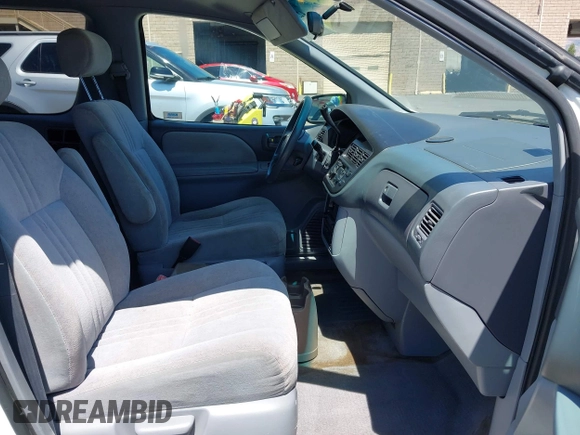 2000 Toyota Sienna CE z VIN 4T3GF19C8YU307987, wystawiony jako IAAI lot #42363309 z przebiegiem 179 374 mil mil oraz . Historia ofert i sprzedaży dostępna na DreamBid. Obrazek 5.