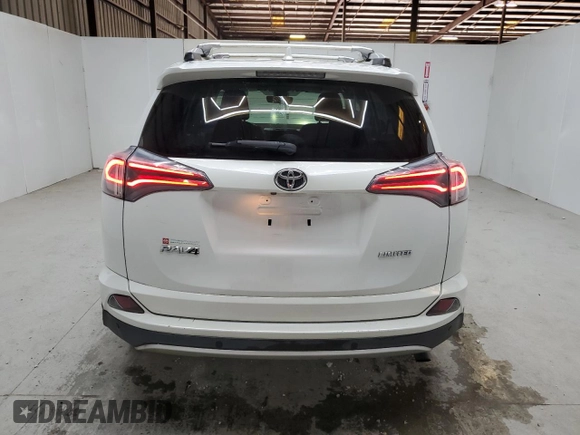 2016 Toyota RAV4 Limited with VIN 2T3YFREV3GW293988, listed as a Copart auction lot 58768425 with 140,214 mi miles and Clean title. Bid and sale history available at DreamBid. Image 6.