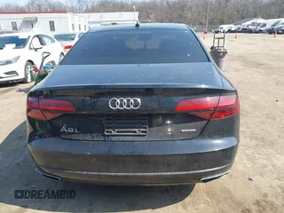 2017 Audi A8 with VIN WAU44AFDXHN004395, listed as a IAAI auction lot 41705688 with 63,282 mi miles and . Bid and sale history available at DreamBid. Image 16.