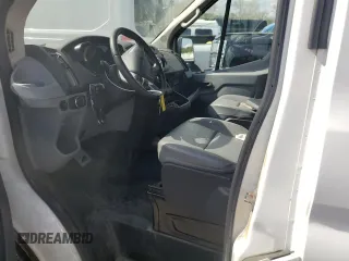 2018 Ford Transit z VIN 1FTBW3XV5JKA09521, wystawiony jako Copart lot #51600575 z przebiegiem 283 267 mil mil oraz Czysty tytuł • Clean title. Historia ofert i sprzedaży dostępna na DreamBid. Obrazek 7.