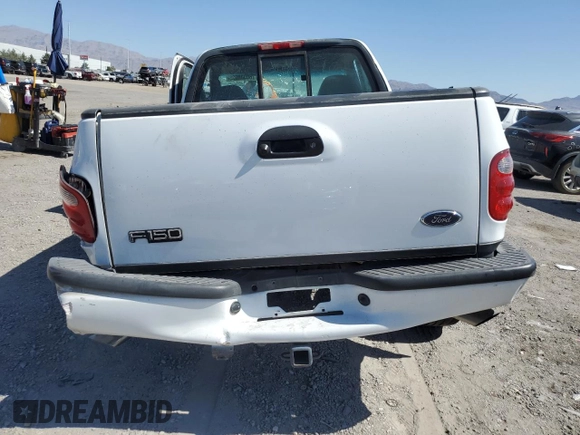 2002 Ford F-150 XL with VIN 1FTRF07L62KD27855, listed as a Copart auction lot 60939935 with Not provided miles and Salvage title. Bid and sale history available at DreamBid. Image 6.
