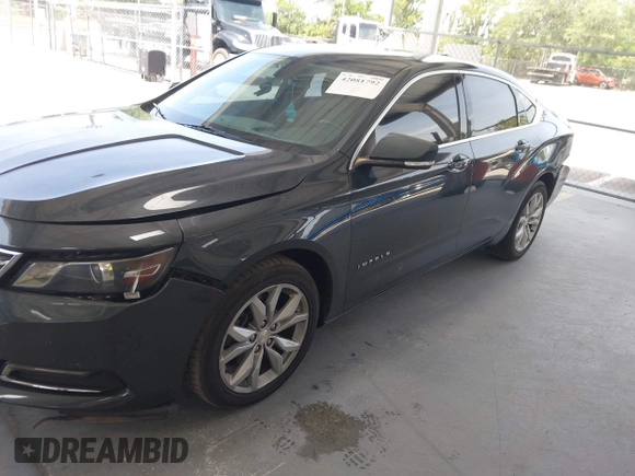 2018 Chevrolet Impala LT with VIN 1G1105S34JU122484, listed as a IAAI auction lot 42081792 with 166,943 mi miles and . Bid and sale history available at DreamBid. Image 2.