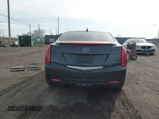 2014 Cadillac ATS Luxury AWD z VIN 1G6AH5RX6E0140302, wystawiony jako IAAI lot #41843454 z przebiegiem 125 388 mil mil oraz . Historia ofert i sprzedaży dostępna na DreamBid. Obrazek 16.