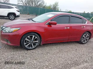 2017 Nissan Altima SV with VIN 1N4AL3AP6HC485821, listed as a IAAI auction lot 42012394 with 118,686 mi miles and . Bid and sale history available at carsss.com. Image 14.