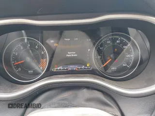 2015 Jeep Cherokee Trailhawk with VIN 1C4PJMBS0FW524479, listed as a IAAI auction lot 41908871 with 118,825 mi miles and . Bid and sale history available at DreamBid. Image 7.