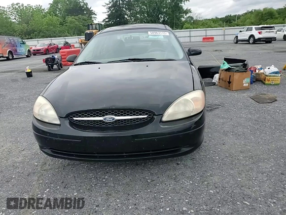 2001 Ford Taurus SEL with VIN 1FAFP56S01A258399, listed as a Copart auction lot 58963115 with 162,989 mi miles and Salvage title. Bid and sale history available at DreamBid. Image 13.