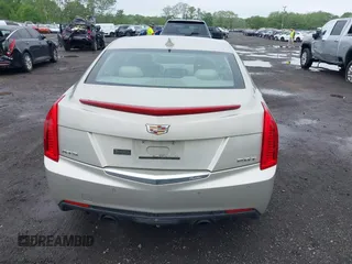 2015 Cadillac ATS Luxury RWD z VIN 1G6AB5RX8F0101942, wystawiony jako IAAI lot #42199906 z przebiegiem 58 627 mil mil oraz . Historia ofert i sprzedaży dostępna na DreamBid. Obrazek 16.