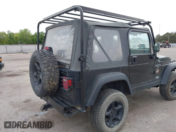 2000 Jeep Wrangler Sahara with VIN 1J4FA59S7YP805628, listed as a IAAI auction lot 42259201 with Not provided miles and . Bid and sale history available at DreamBid. Image 13.