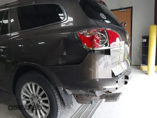 2012 Buick Enclave Leather with VIN 5GAKVCED4CJ223097, listed as a IAAI auction lot 42053378 with 125,036 mi miles and . Bid and sale history available at carsss.com. Image 6.