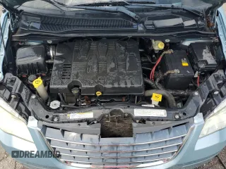 2009 Chrysler Town & Country Touring with VIN 2A8HR54X39R667914, listed as a Copart auction lot 66010904 with 214,583 mi miles and Salvage Title. Bid and sale history available at DreamBid. Image 12.