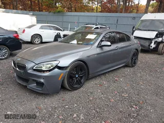 2016 BMW 6 Series 640i xDrive with VIN WBA6D2C50GGT66007, listed as a IAAI auction lot 40673899 with 73,695 mi miles. Bid and sale history available at carsss.com. Image 17.